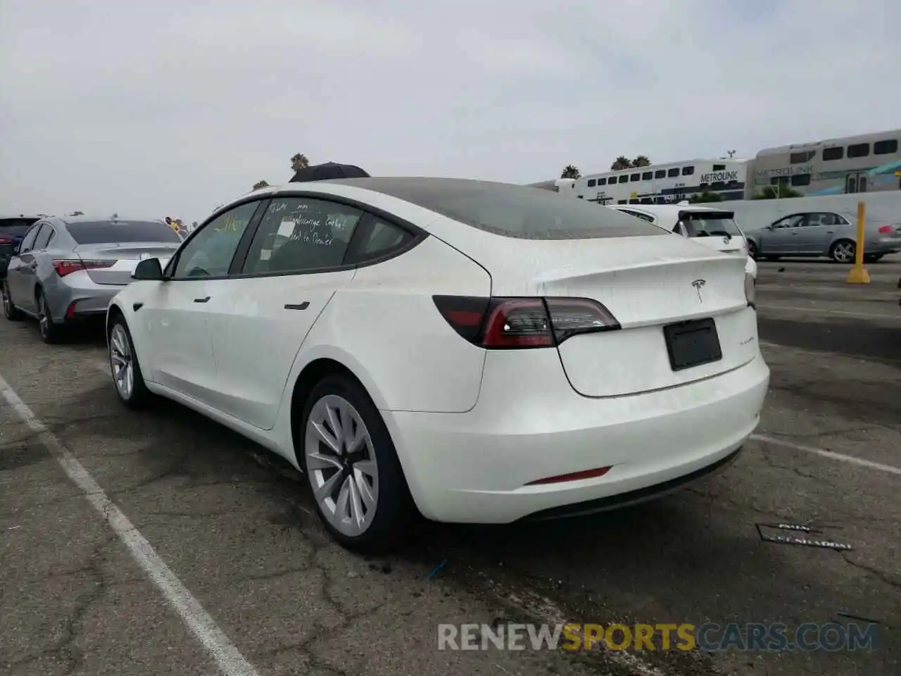 3 Photograph of a damaged car 5YJ3E1EB8NF144158 TESLA MODEL 3 2022