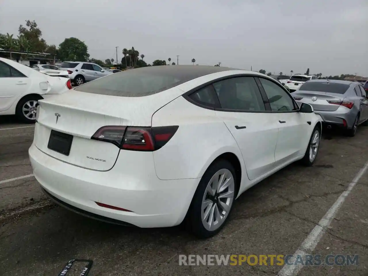 4 Photograph of a damaged car 5YJ3E1EB8NF144158 TESLA MODEL 3 2022