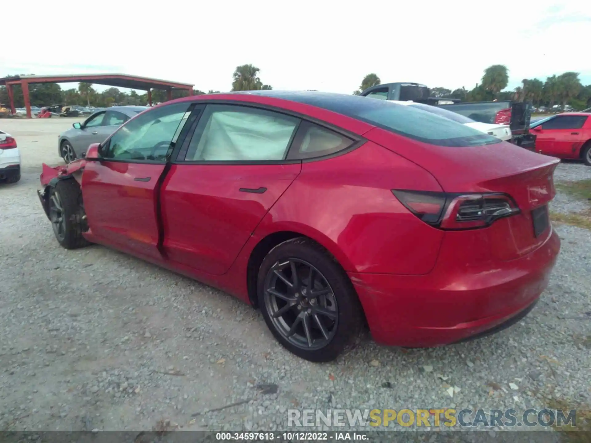 3 Photograph of a damaged car 5YJ3E1EB8NF184000 TESLA MODEL 3 2022