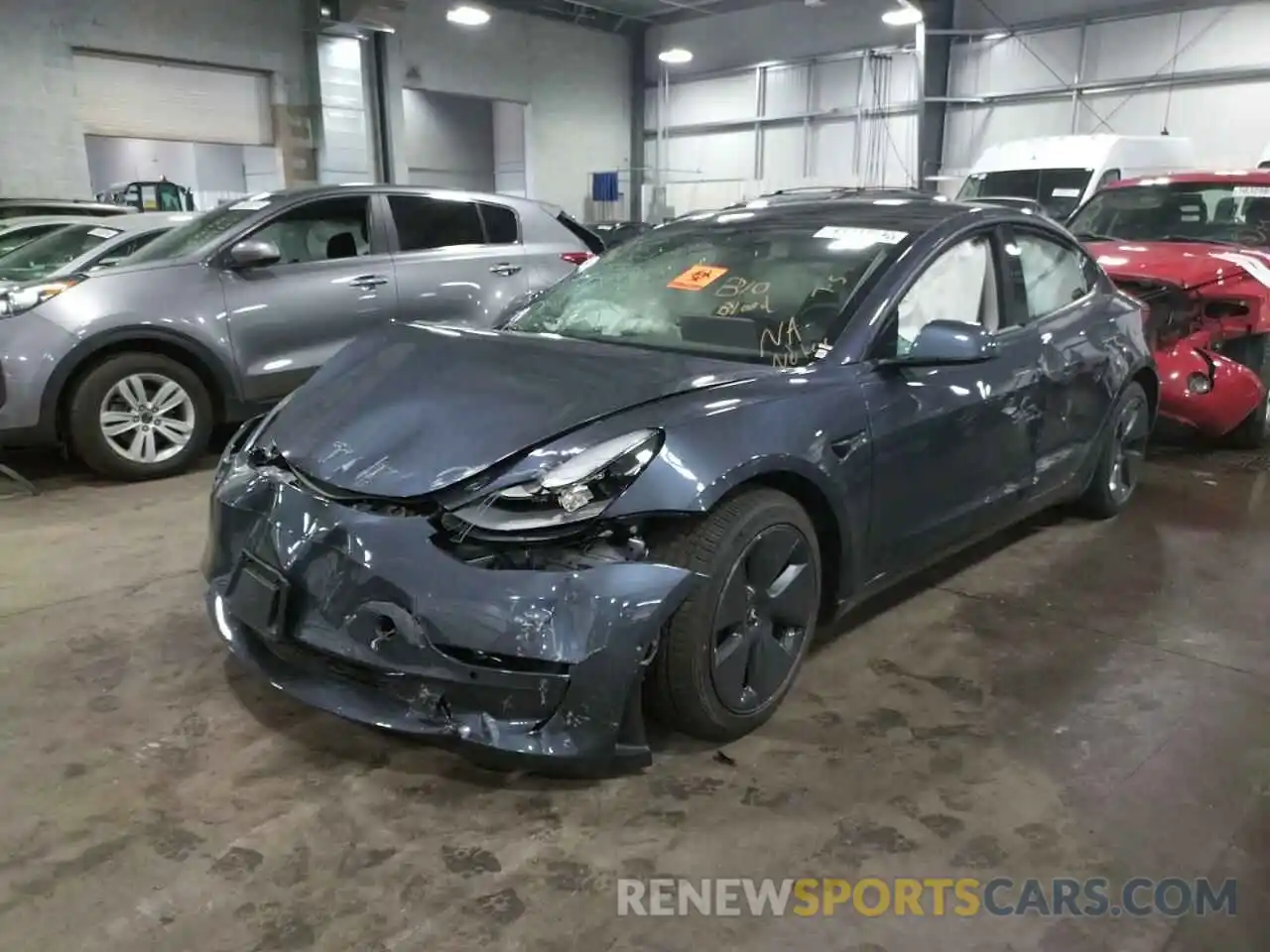 2 Photograph of a damaged car 5YJ3E1EB8NF185468 TESLA MODEL 3 2022