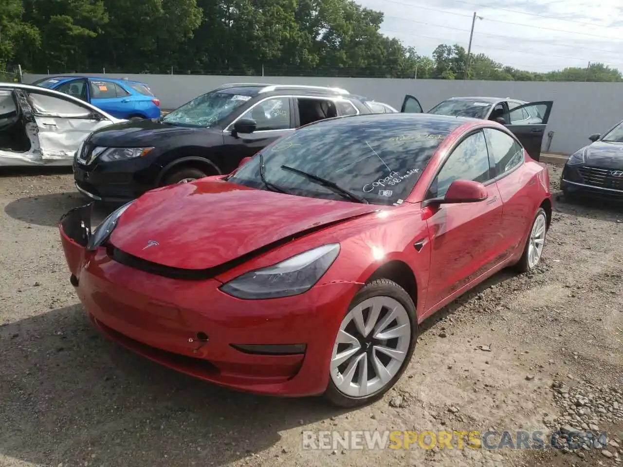 2 Photograph of a damaged car 5YJ3E1EB8NF186538 TESLA MODEL 3 2022