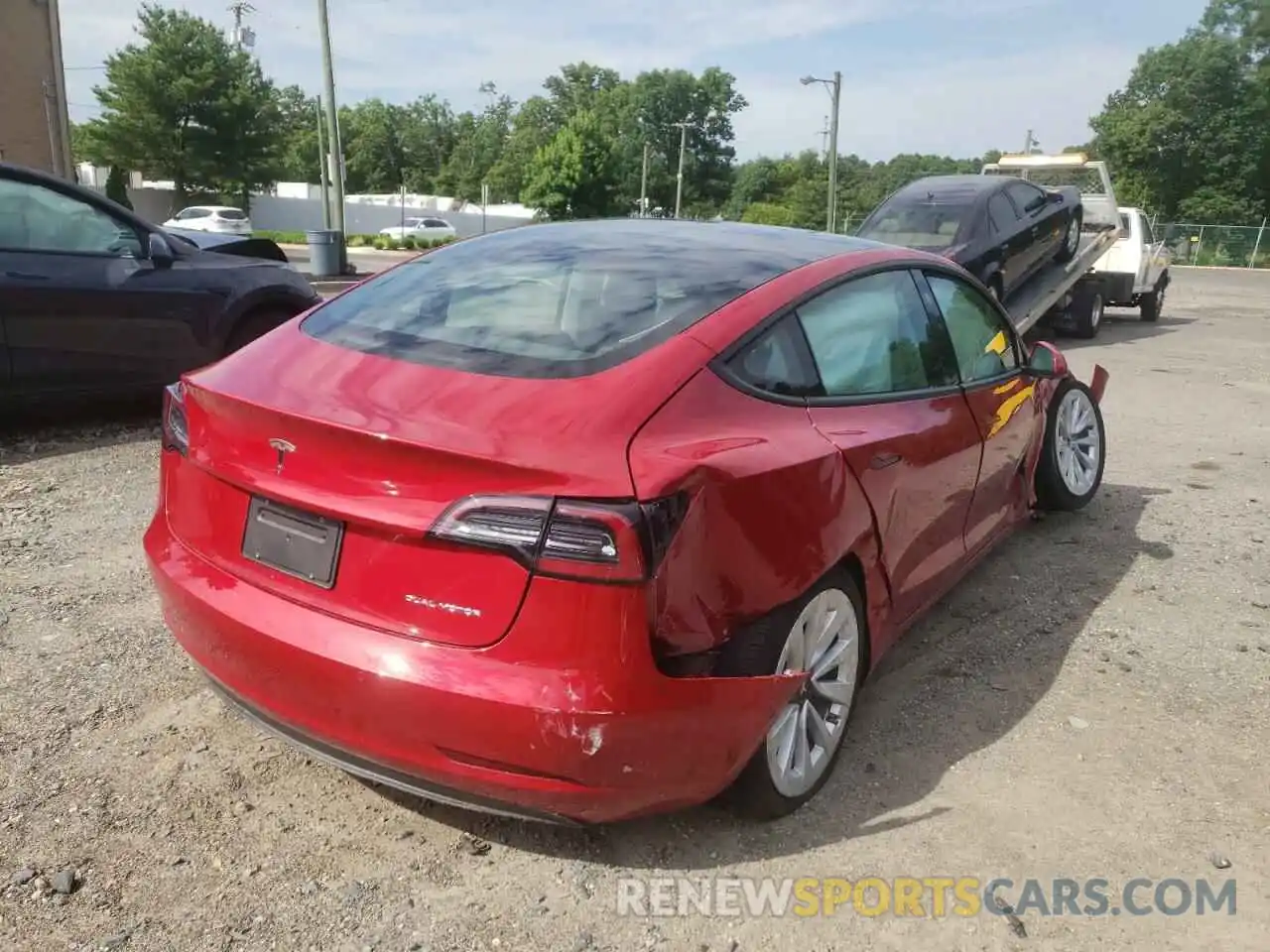 4 Photograph of a damaged car 5YJ3E1EB8NF186538 TESLA MODEL 3 2022