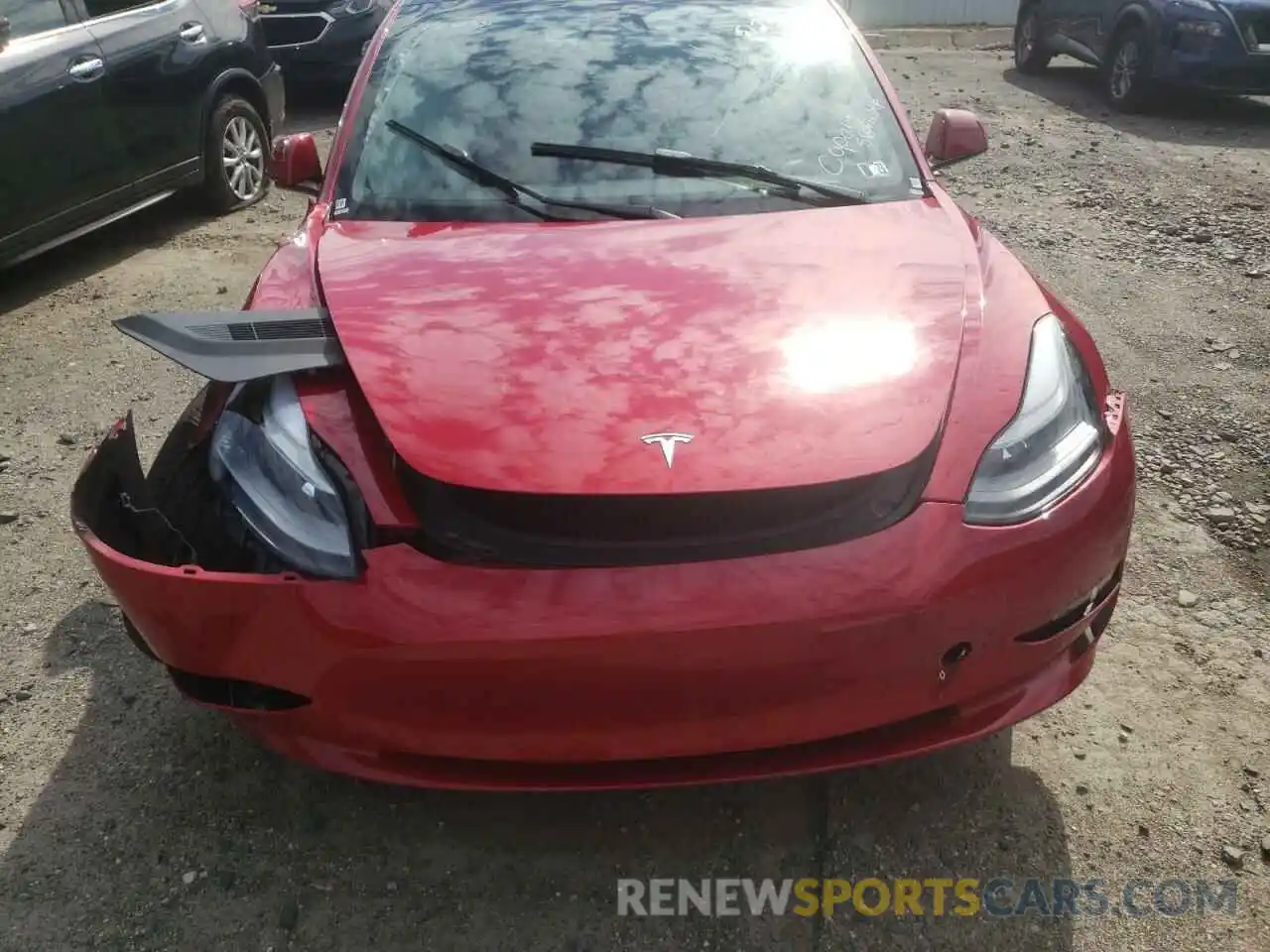 7 Photograph of a damaged car 5YJ3E1EB8NF186538 TESLA MODEL 3 2022