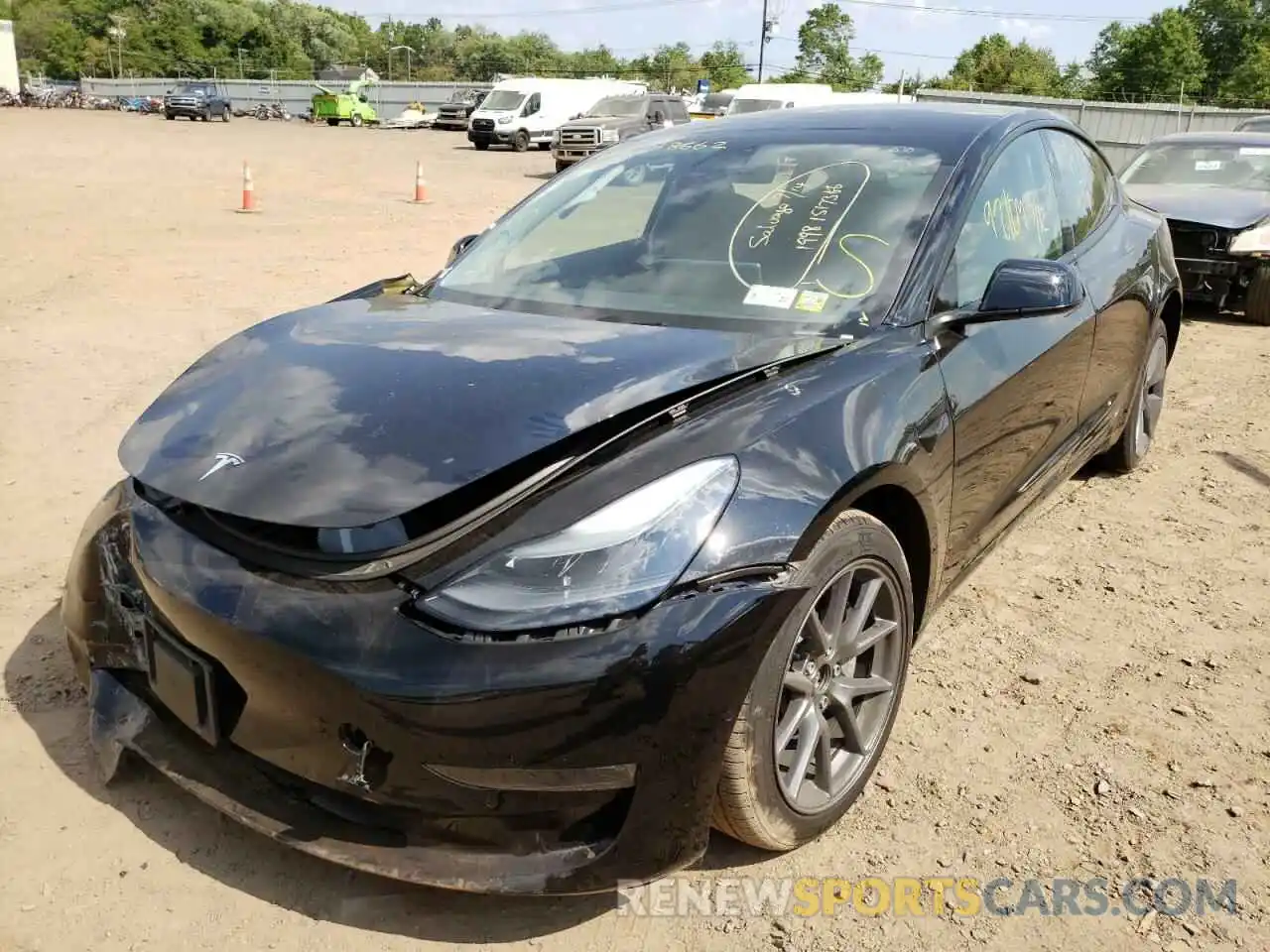 2 Photograph of a damaged car 5YJ3E1EB8NF186927 TESLA MODEL 3 2022