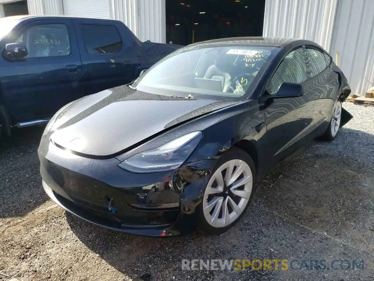 2 Photograph of a damaged car 5YJ3E1EB8NF192288 TESLA MODEL 3 2022