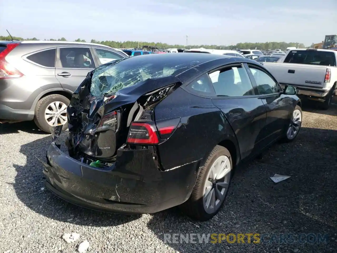 4 Photograph of a damaged car 5YJ3E1EB8NF192288 TESLA MODEL 3 2022