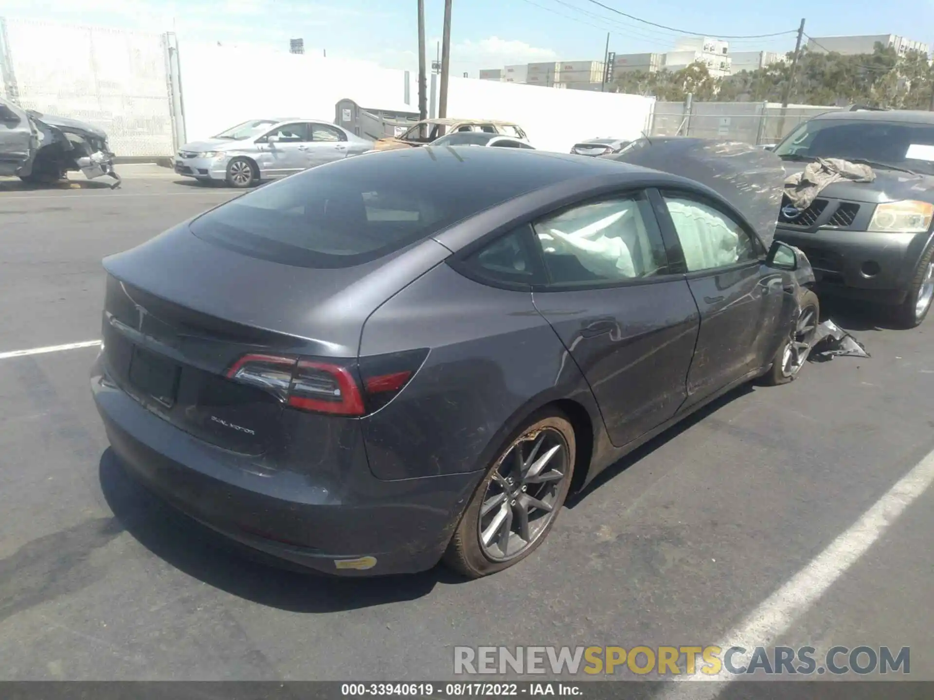 4 Photograph of a damaged car 5YJ3E1EB8NF207789 TESLA MODEL 3 2022