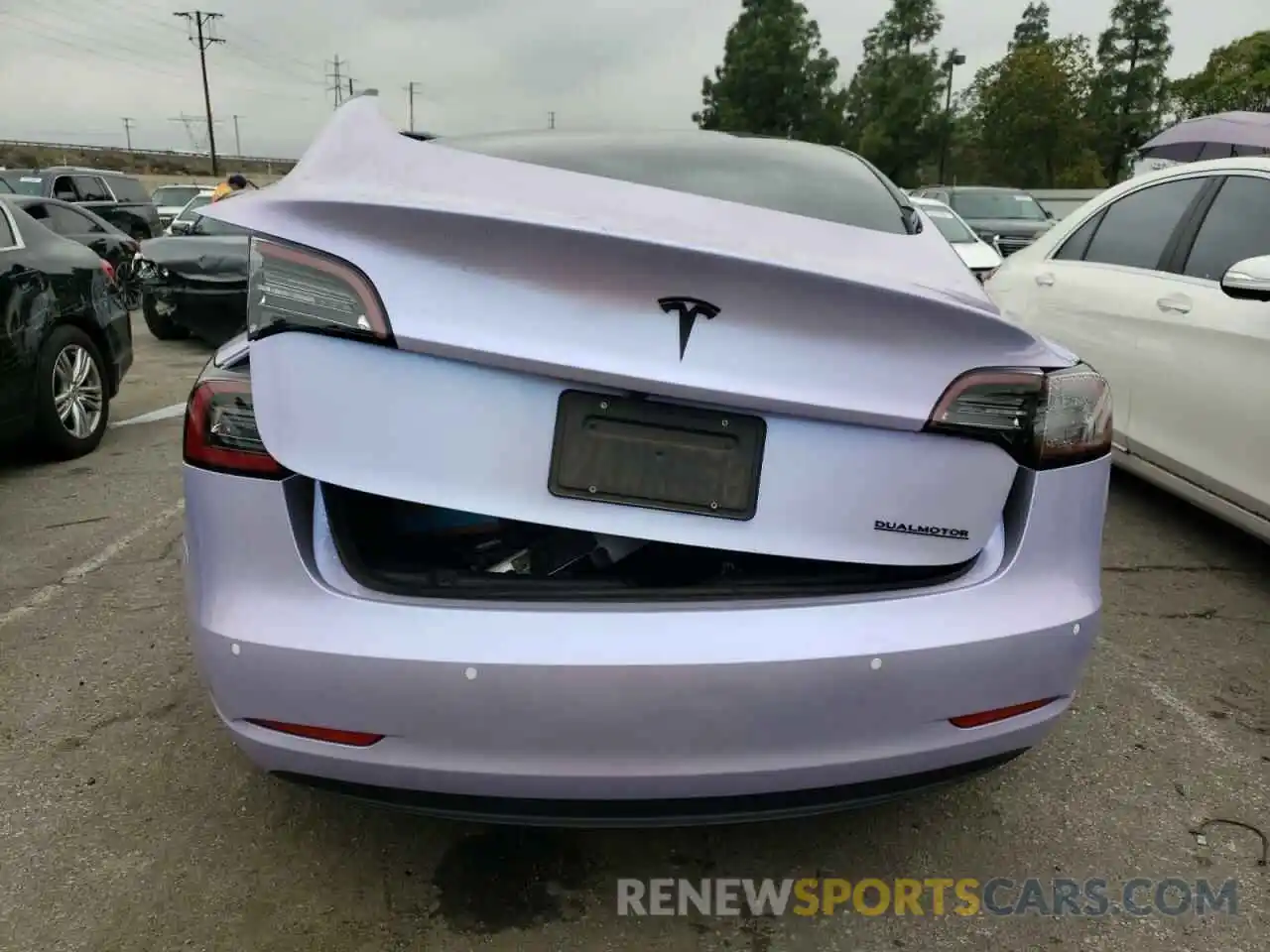 6 Photograph of a damaged car 5YJ3E1EB8NF208070 TESLA MODEL 3 2022