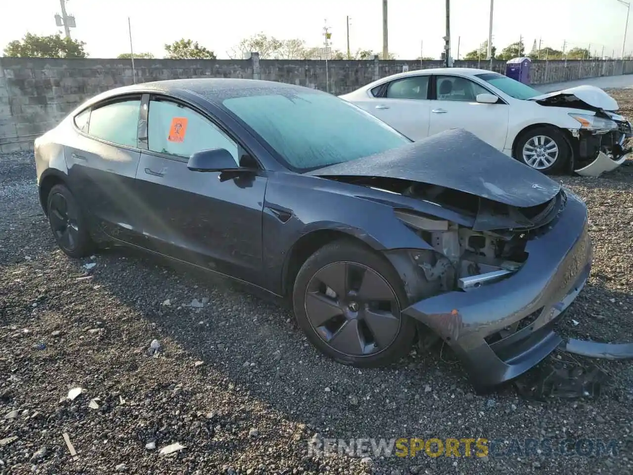 4 Photograph of a damaged car 5YJ3E1EB8NF287871 TESLA MODEL 3 2022