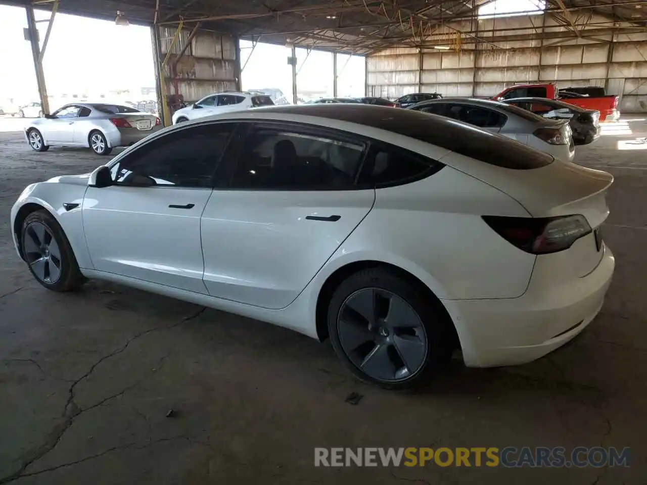 2 Photograph of a damaged car 5YJ3E1EB9NF103084 TESLA MODEL 3 2022