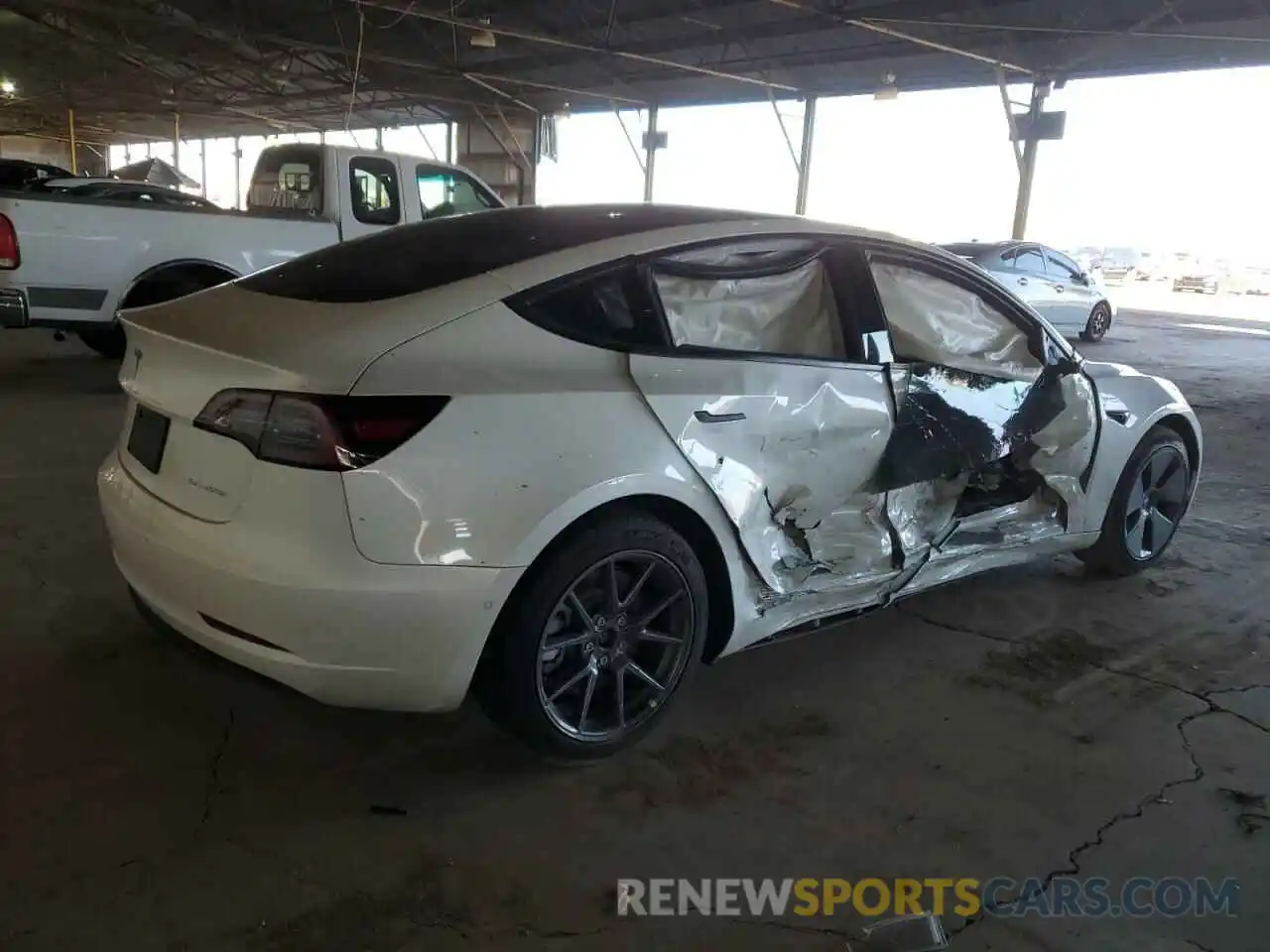 3 Photograph of a damaged car 5YJ3E1EB9NF103084 TESLA MODEL 3 2022