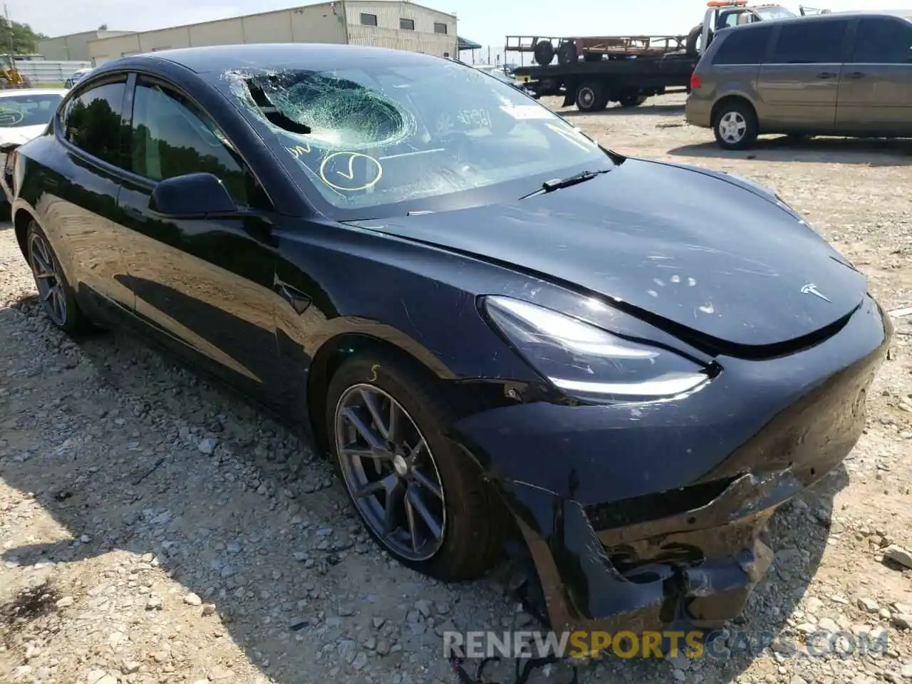 1 Photograph of a damaged car 5YJ3E1EB9NF103411 TESLA MODEL 3 2022