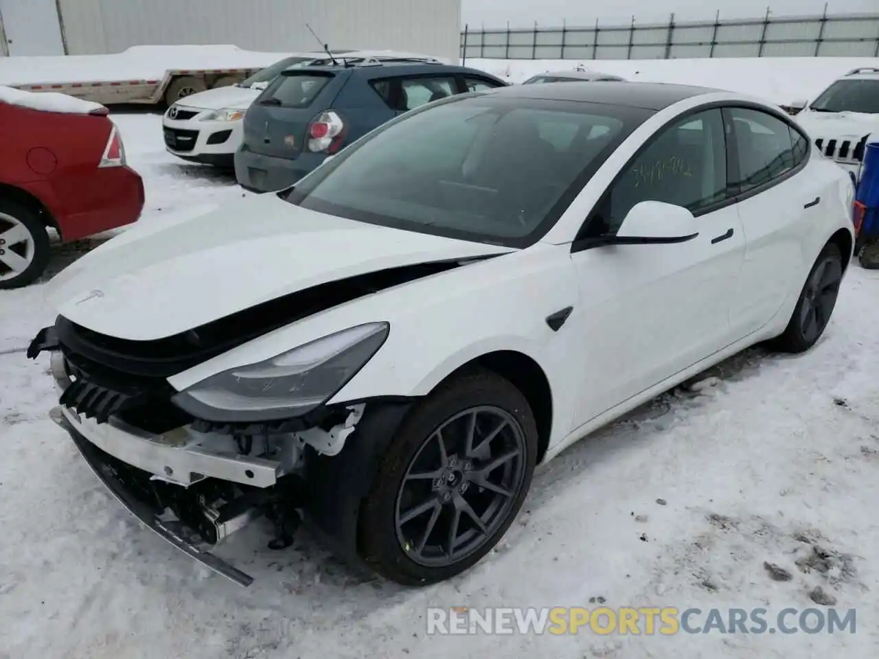 2 Photograph of a damaged car 5YJ3E1EB9NF108088 TESLA MODEL 3 2022