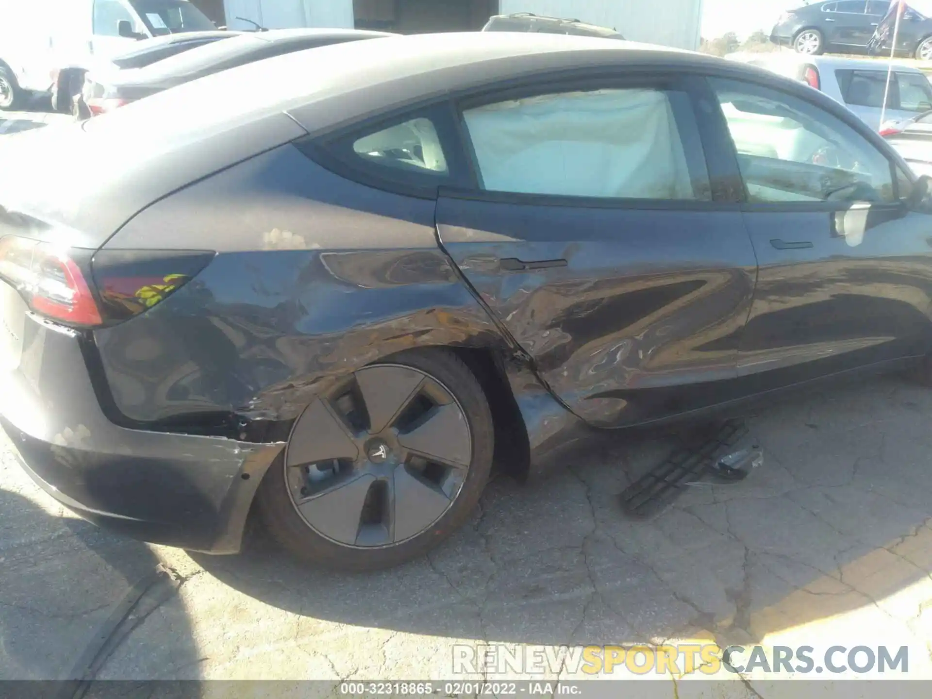 6 Photograph of a damaged car 5YJ3E1EB9NF115090 TESLA MODEL 3 2022