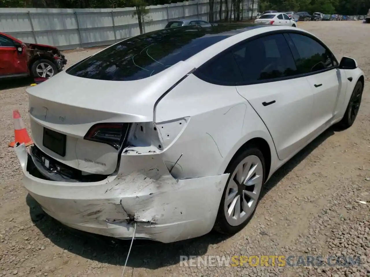 4 Photograph of a damaged car 5YJ3E1EB9NF118507 TESLA MODEL 3 2022