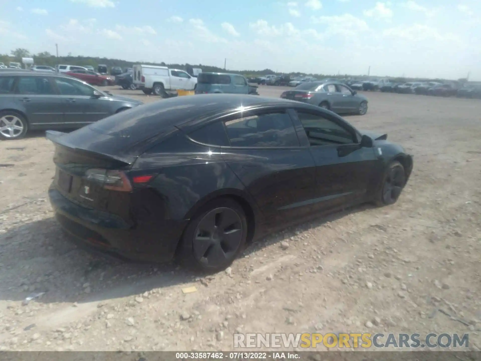 4 Photograph of a damaged car 5YJ3E1EB9NF121228 TESLA MODEL 3 2022