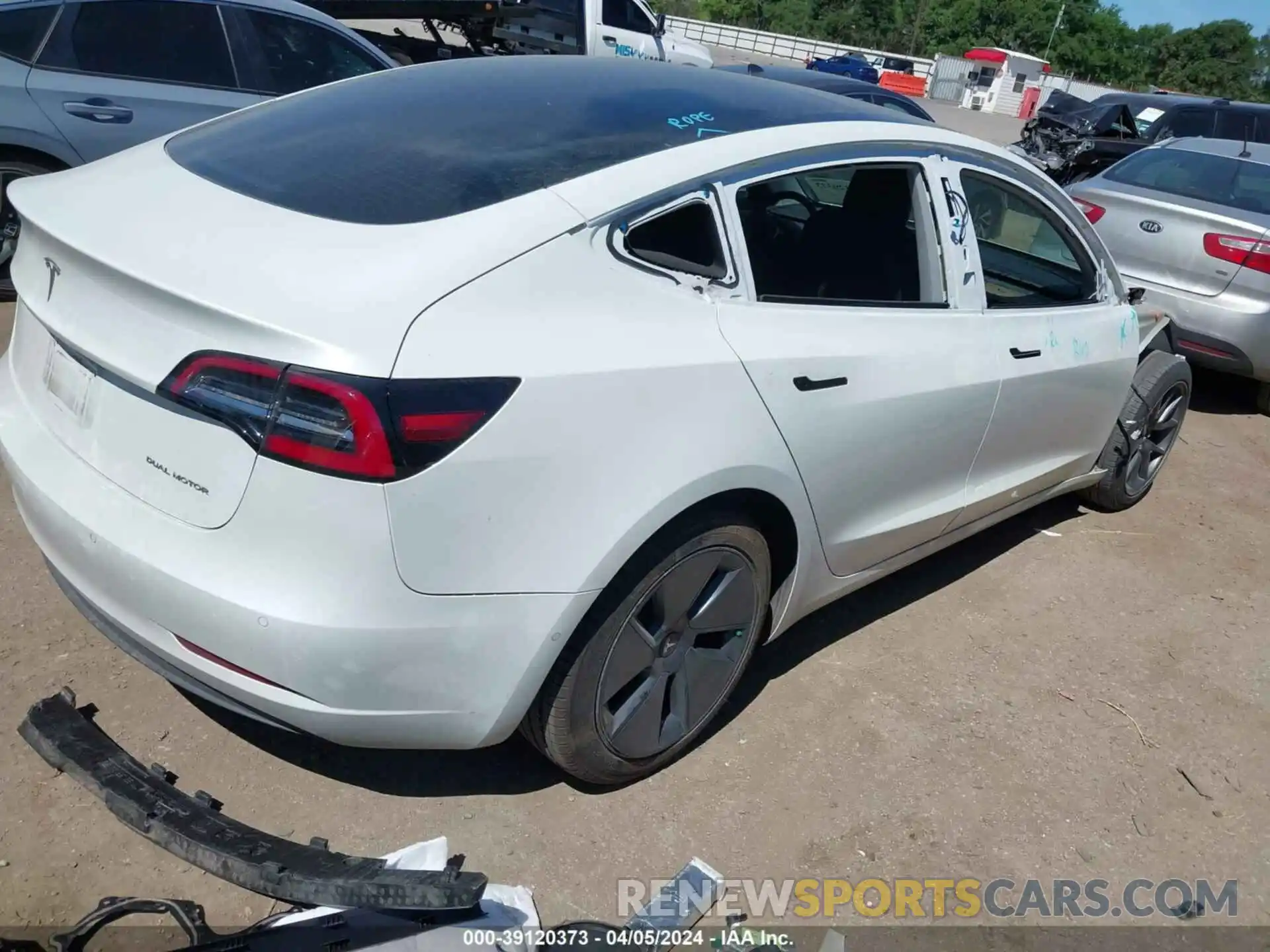 4 Photograph of a damaged car 5YJ3E1EB9NF122525 TESLA MODEL 3 2022