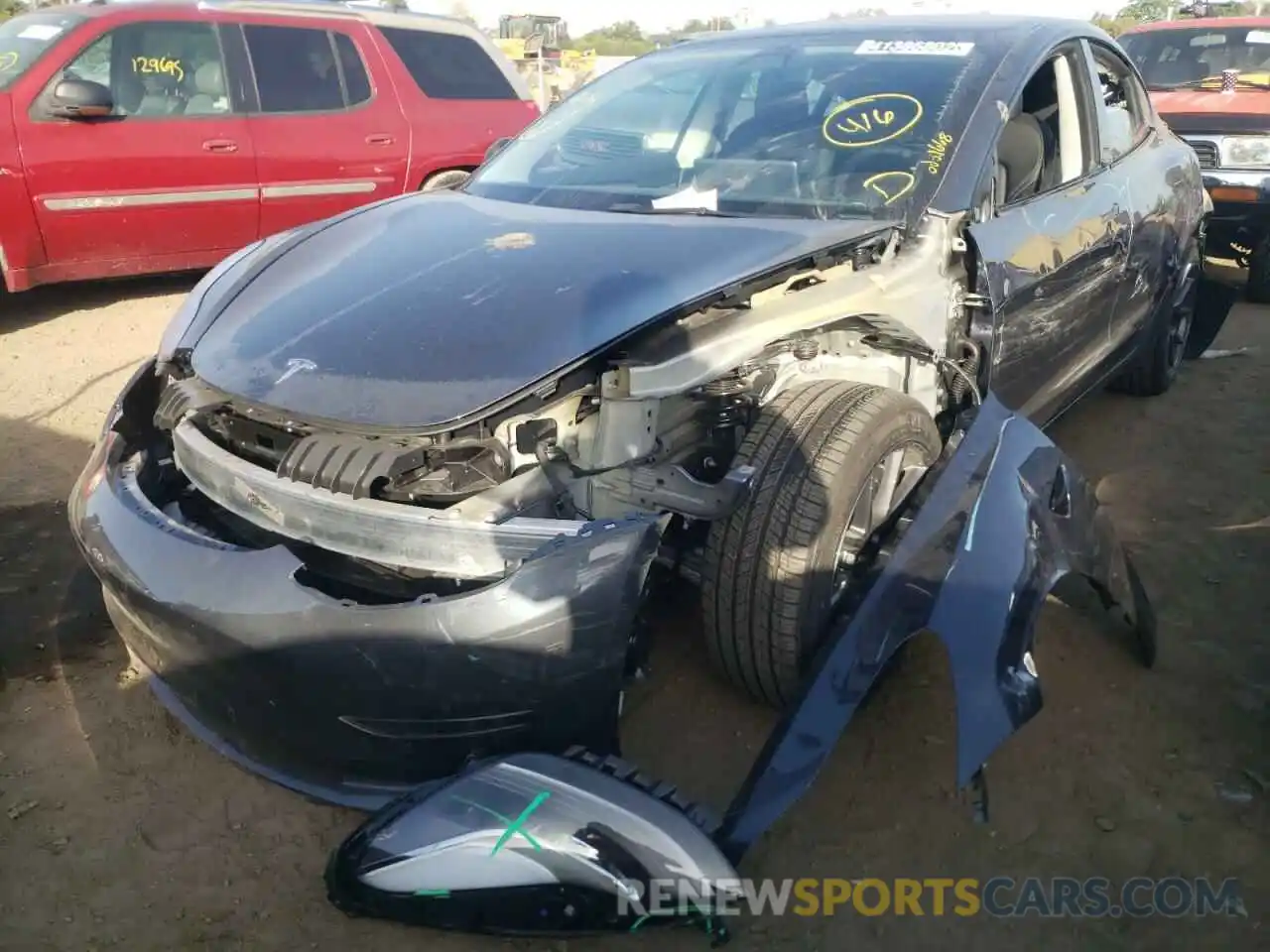 2 Photograph of a damaged car 5YJ3E1EB9NF123853 TESLA MODEL 3 2022