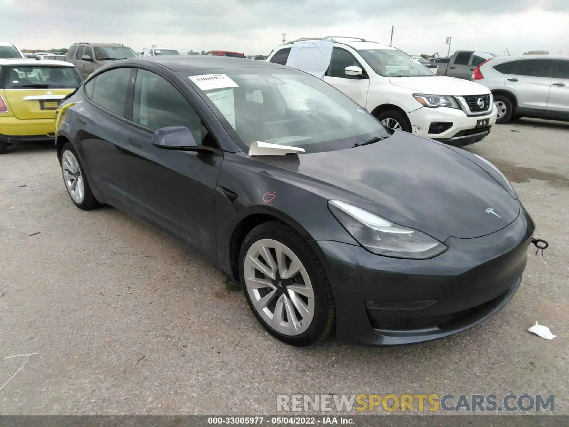 1 Photograph of a damaged car 5YJ3E1EB9NF127739 TESLA MODEL 3 2022