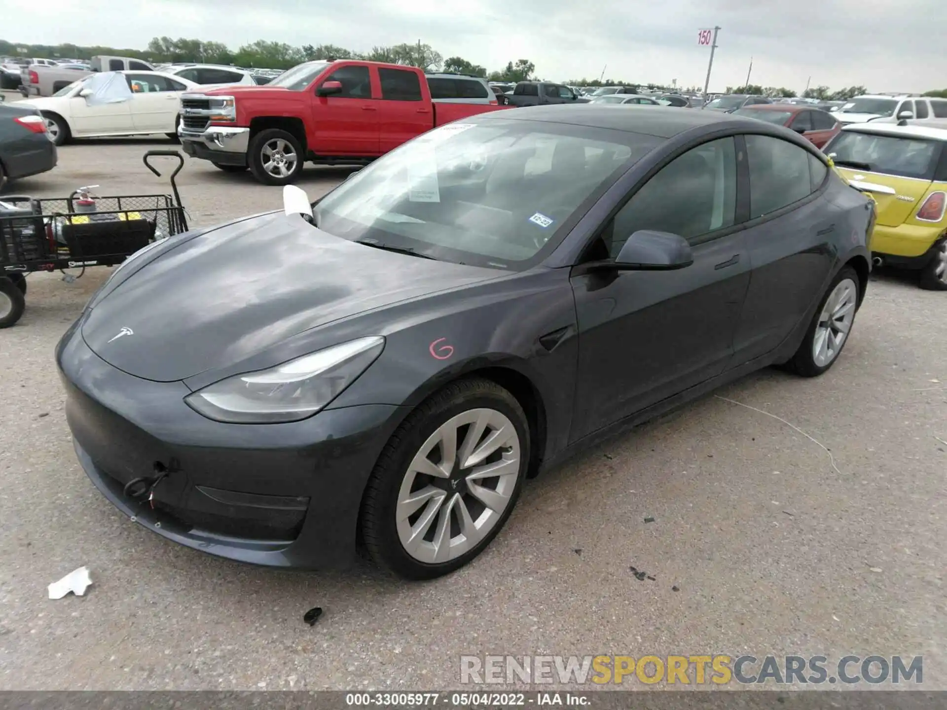 2 Photograph of a damaged car 5YJ3E1EB9NF127739 TESLA MODEL 3 2022