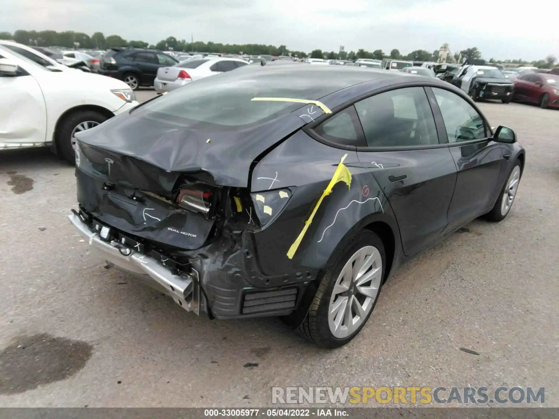 4 Photograph of a damaged car 5YJ3E1EB9NF127739 TESLA MODEL 3 2022