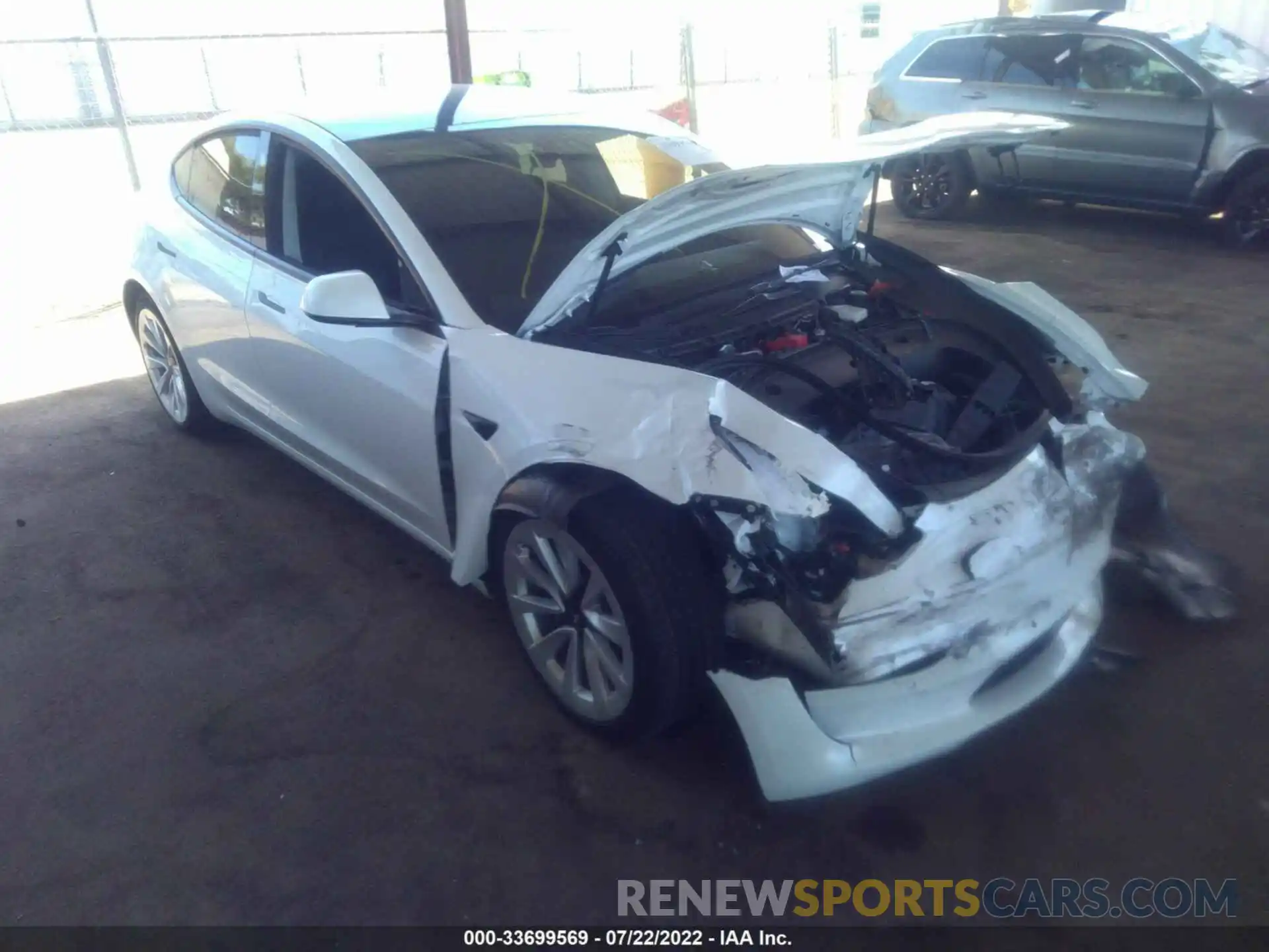 1 Photograph of a damaged car 5YJ3E1EB9NF129877 TESLA MODEL 3 2022