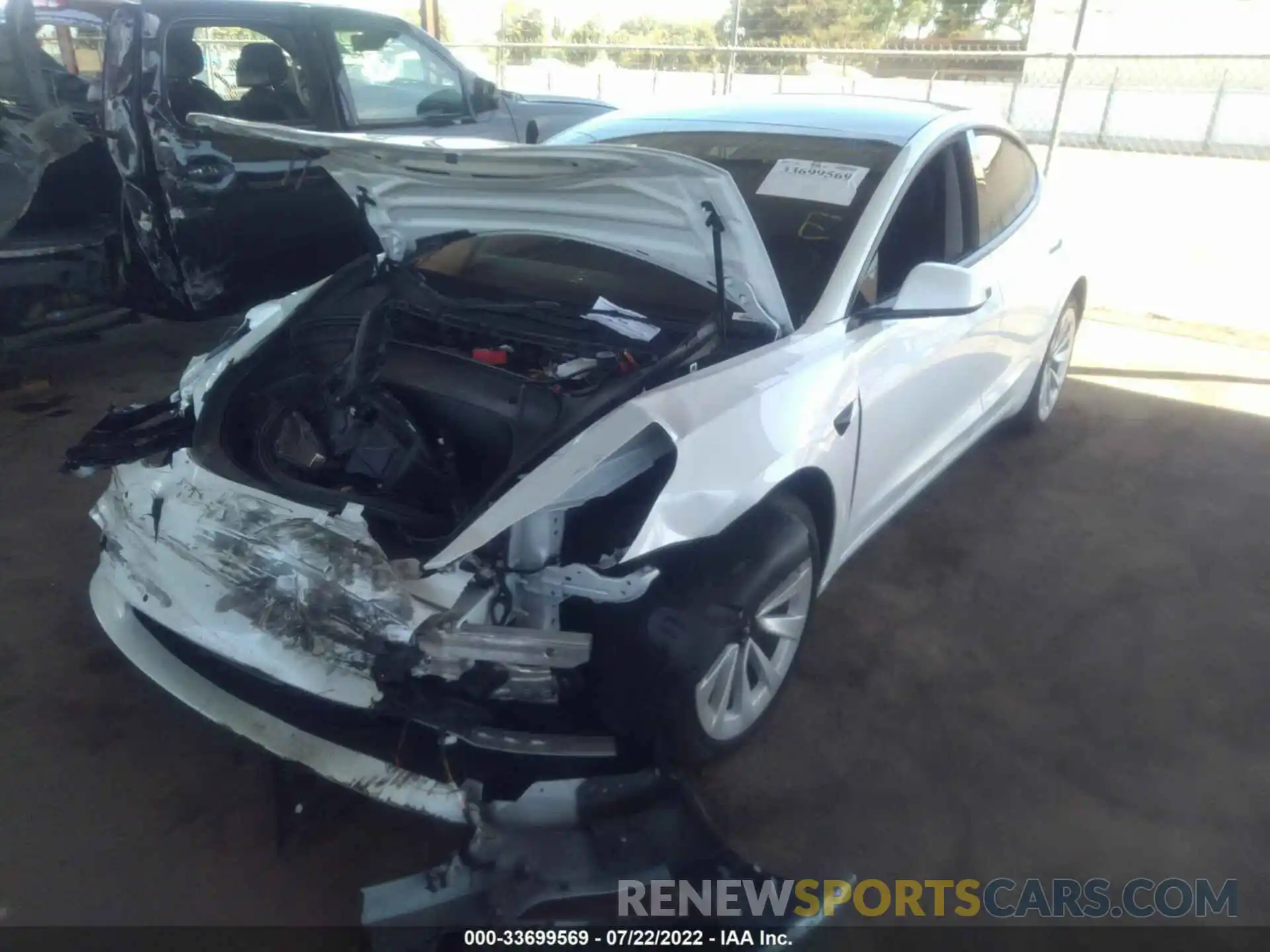 2 Photograph of a damaged car 5YJ3E1EB9NF129877 TESLA MODEL 3 2022