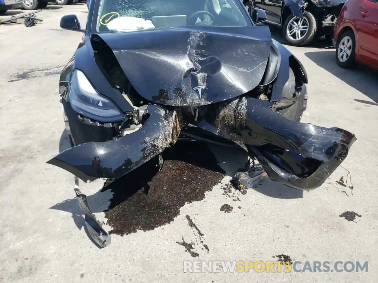 9 Photograph of a damaged car 5YJ3E1EB9NF143293 TESLA MODEL 3 2022