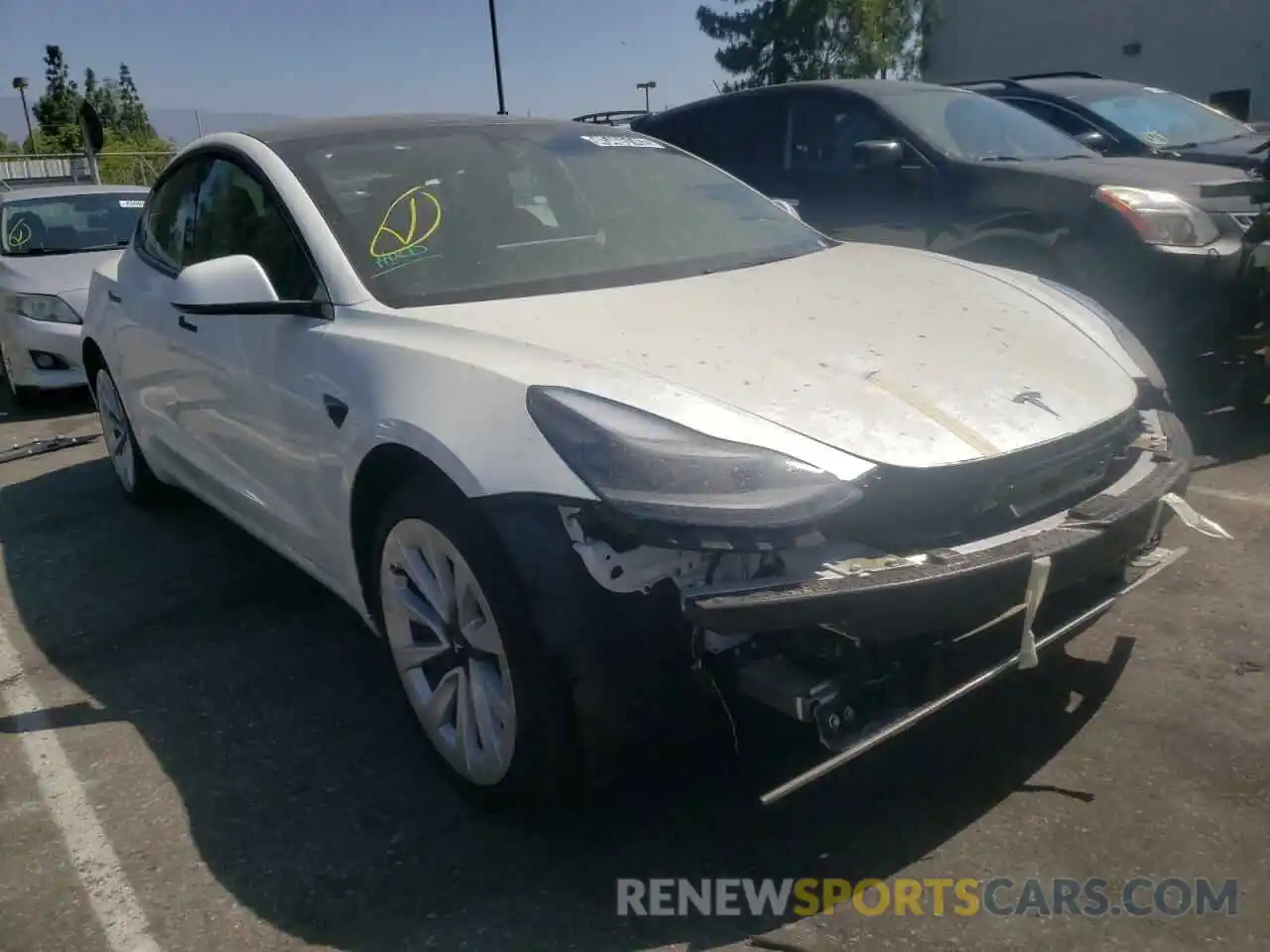 1 Photograph of a damaged car 5YJ3E1EB9NF144654 TESLA MODEL 3 2022