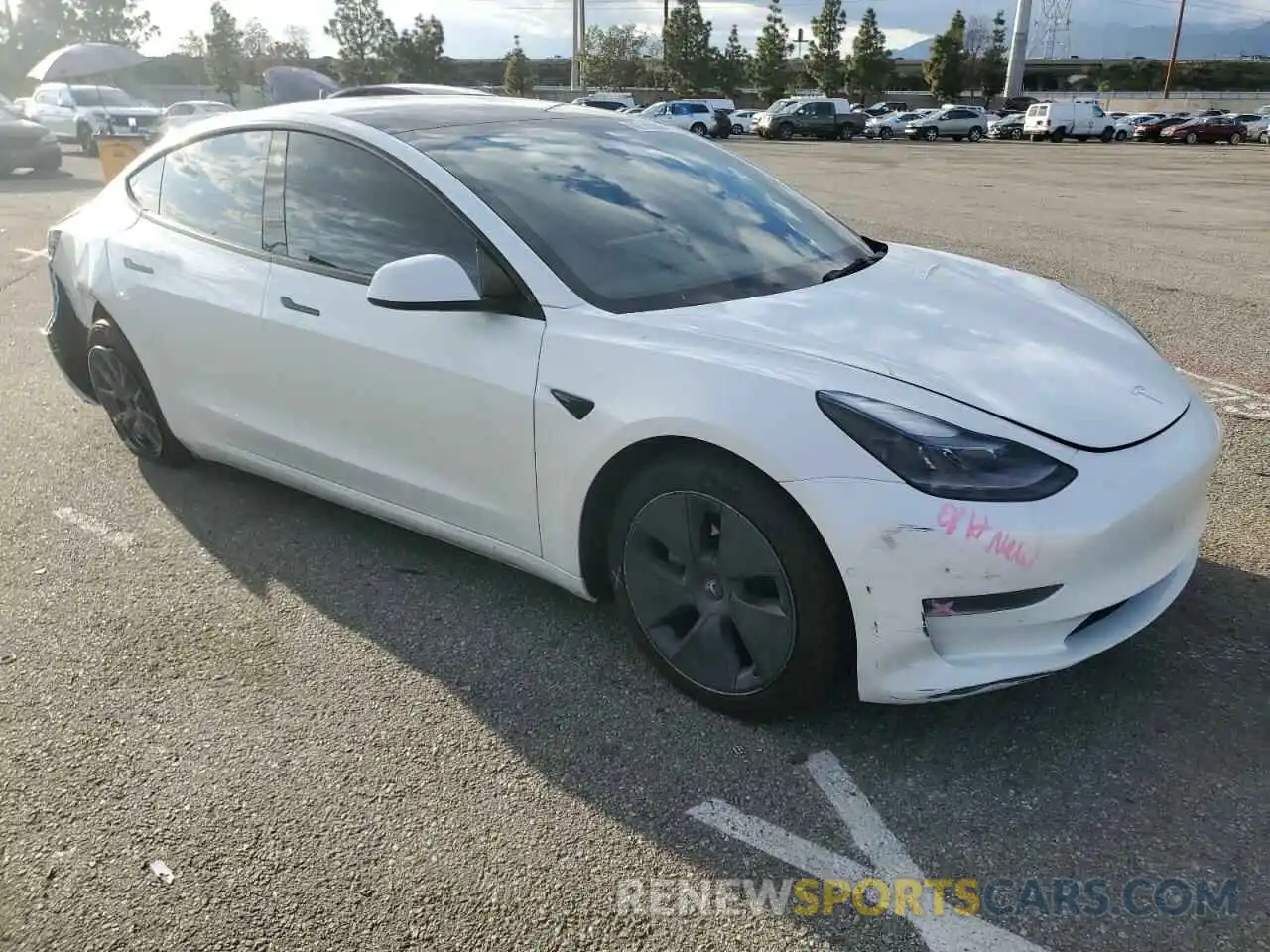 4 Photograph of a damaged car 5YJ3E1EB9NF161387 TESLA MODEL 3 2022