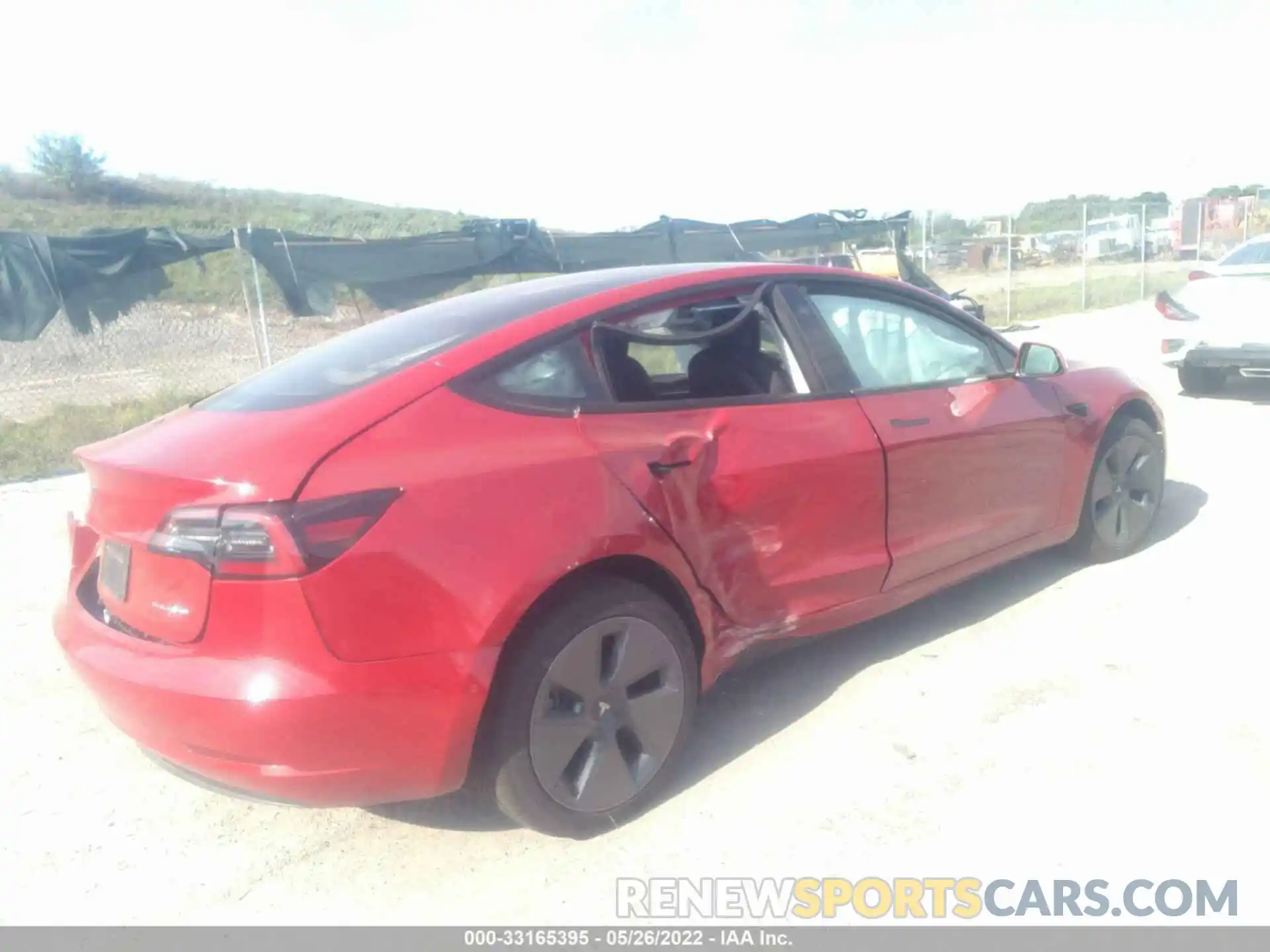 4 Photograph of a damaged car 5YJ3E1EB9NF162541 TESLA MODEL 3 2022