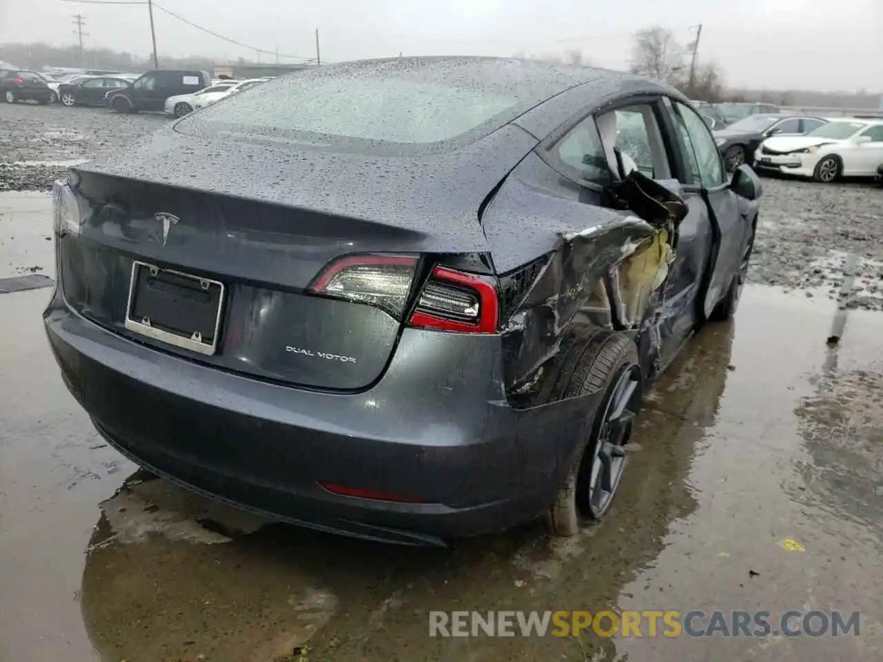 4 Photograph of a damaged car 5YJ3E1EB9NF167335 TESLA MODEL 3 2022