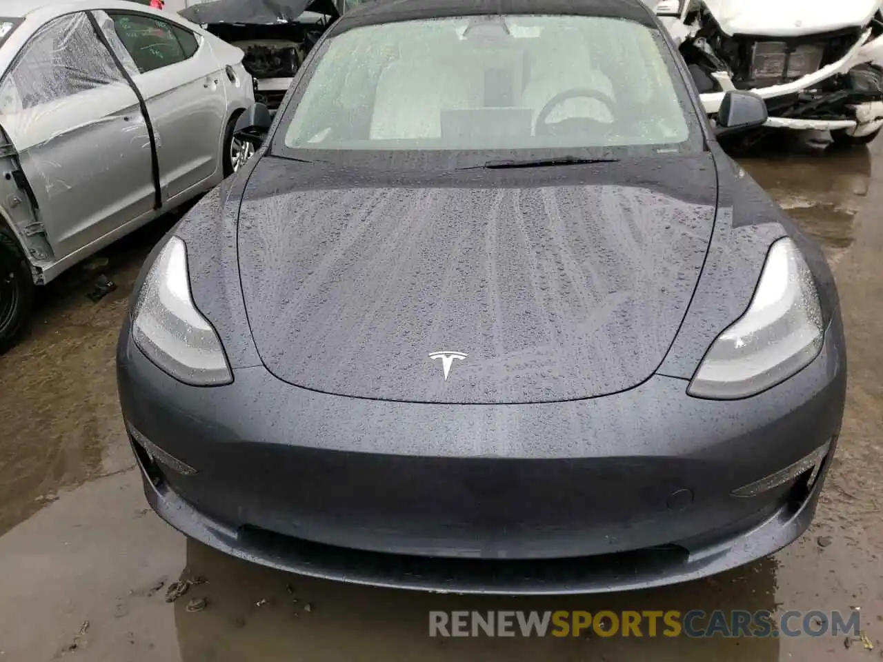 7 Photograph of a damaged car 5YJ3E1EB9NF167335 TESLA MODEL 3 2022