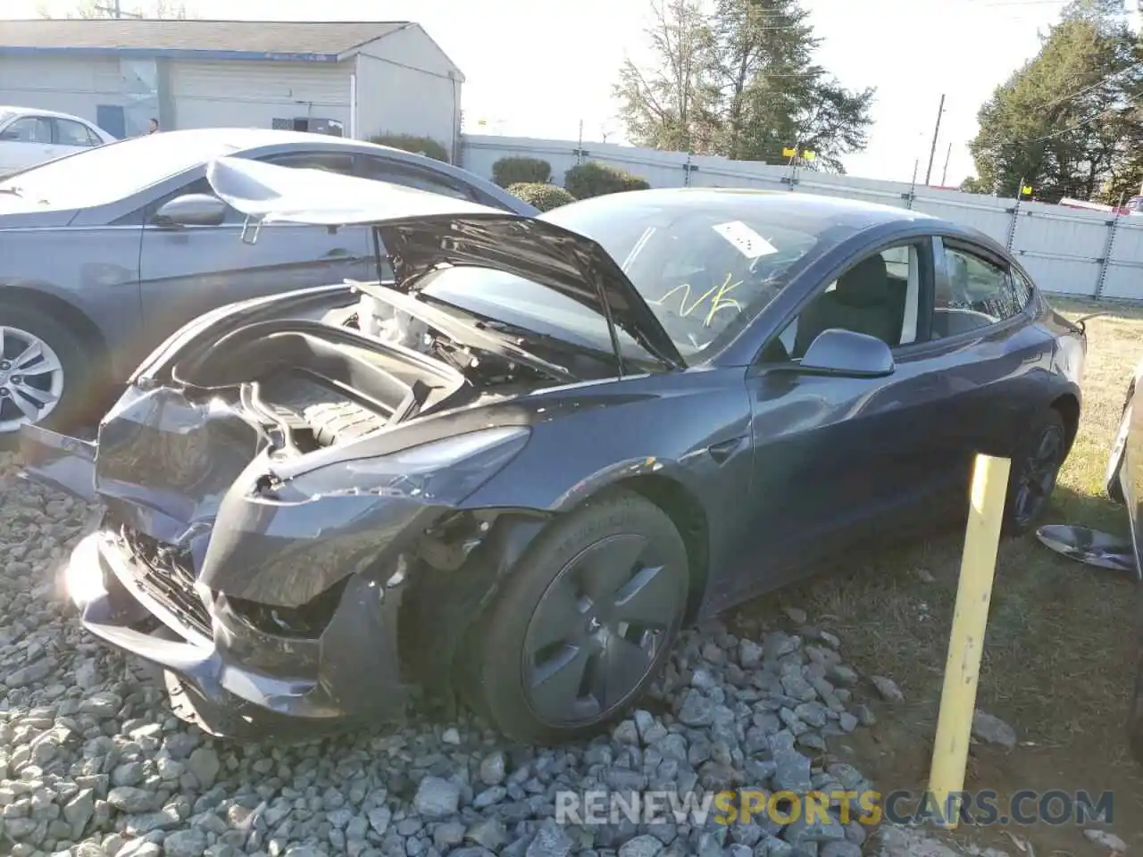 2 Photograph of a damaged car 5YJ3E1EB9NF168033 TESLA MODEL 3 2022