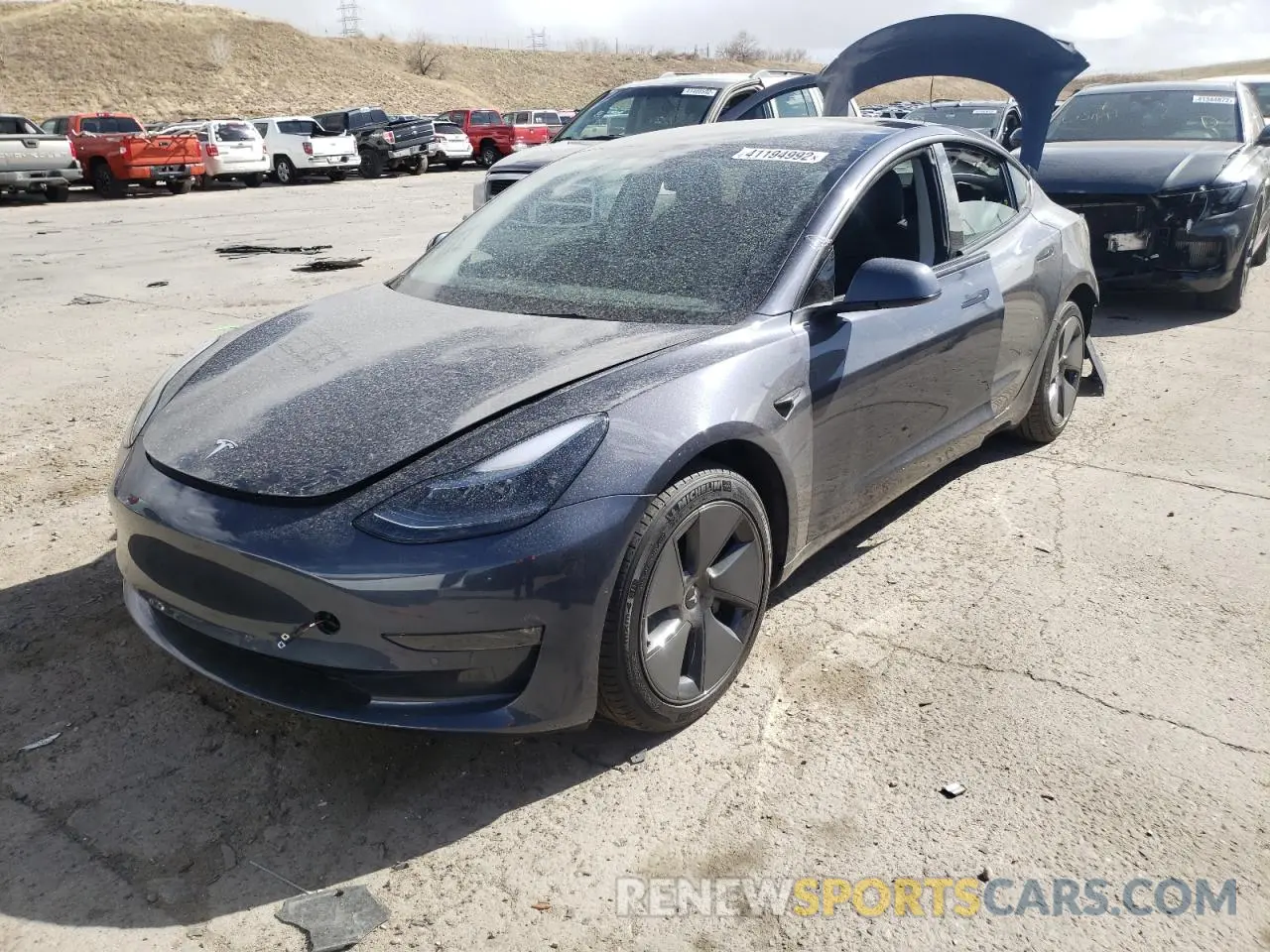 2 Photograph of a damaged car 5YJ3E1EB9NF179534 TESLA MODEL 3 2022