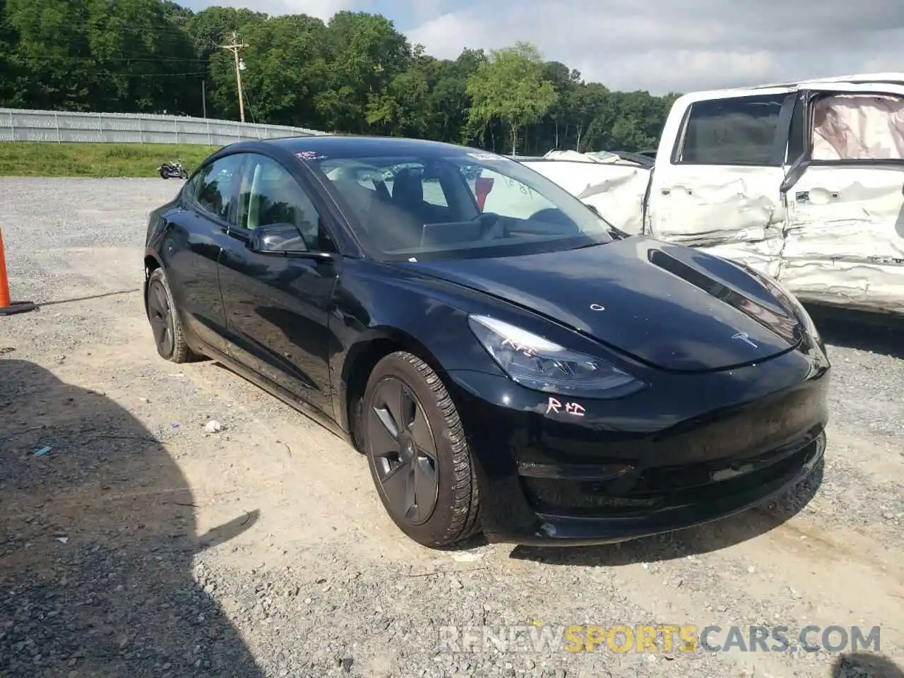 1 Photograph of a damaged car 5YJ3E1EB9NF185527 TESLA MODEL 3 2022