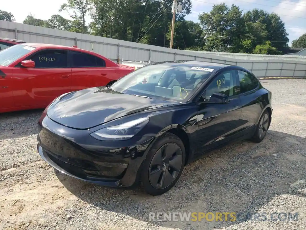 2 Photograph of a damaged car 5YJ3E1EB9NF185527 TESLA MODEL 3 2022