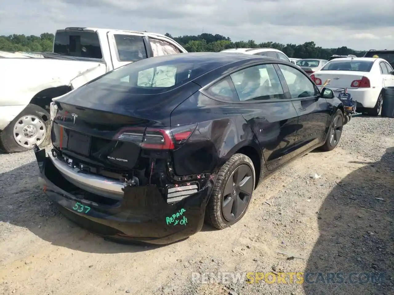 4 Photograph of a damaged car 5YJ3E1EB9NF185527 TESLA MODEL 3 2022