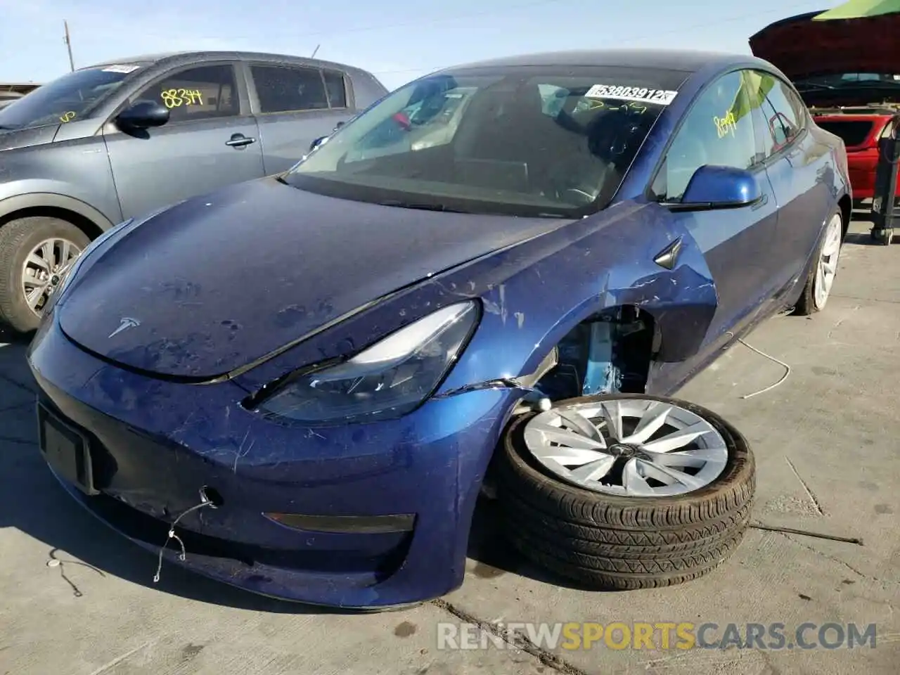 2 Photograph of a damaged car 5YJ3E1EB9NF185642 TESLA MODEL 3 2022