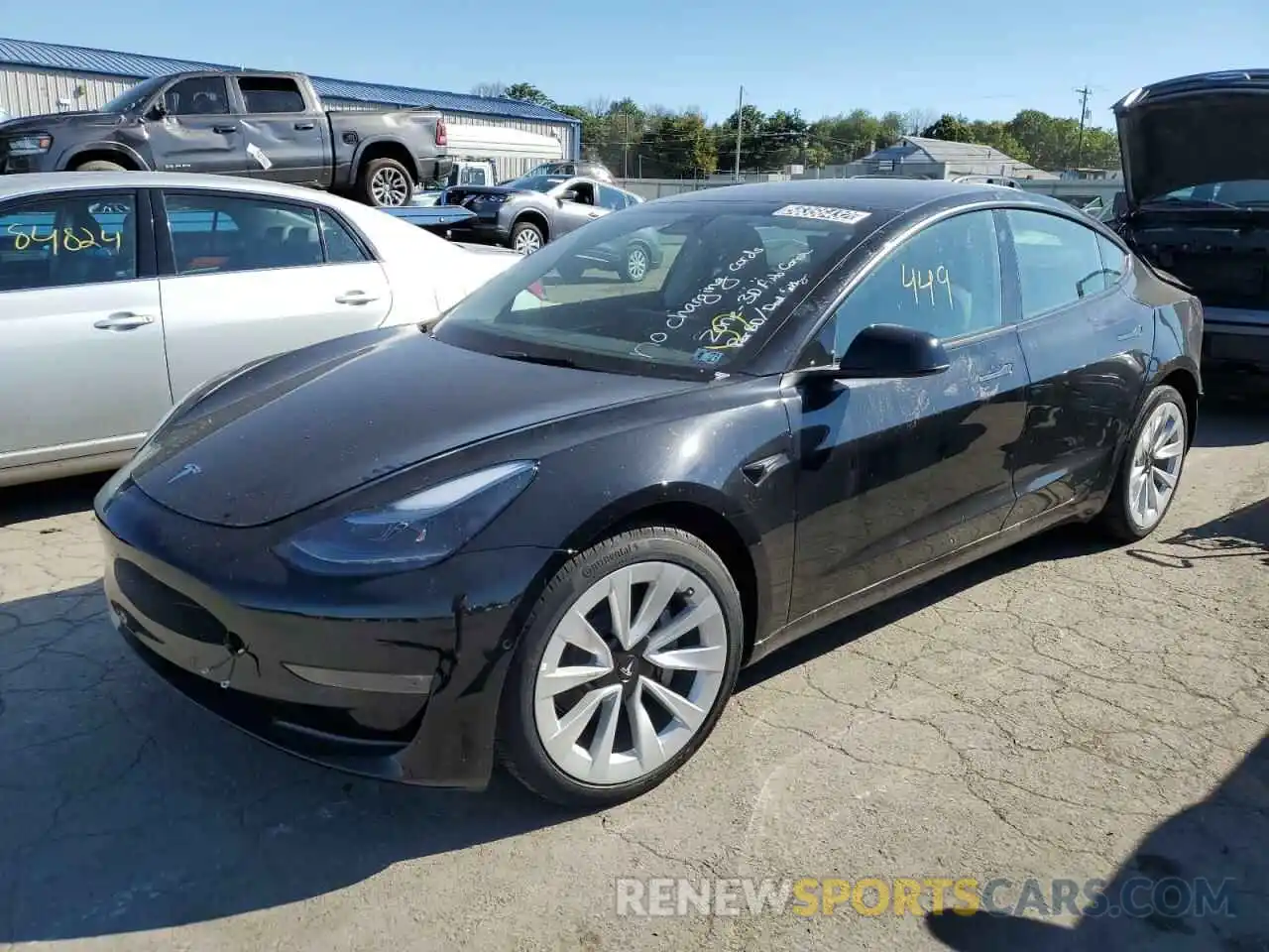 2 Photograph of a damaged car 5YJ3E1EB9NF187942 TESLA MODEL 3 2022