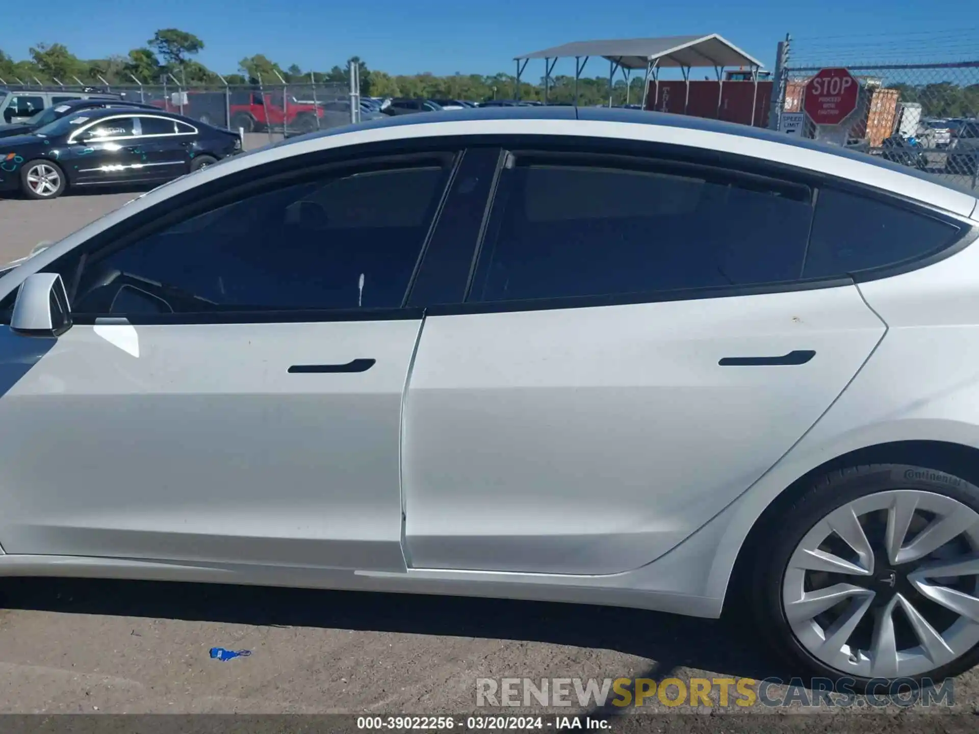 14 Photograph of a damaged car 5YJ3E1EB9NF195734 TESLA MODEL 3 2022