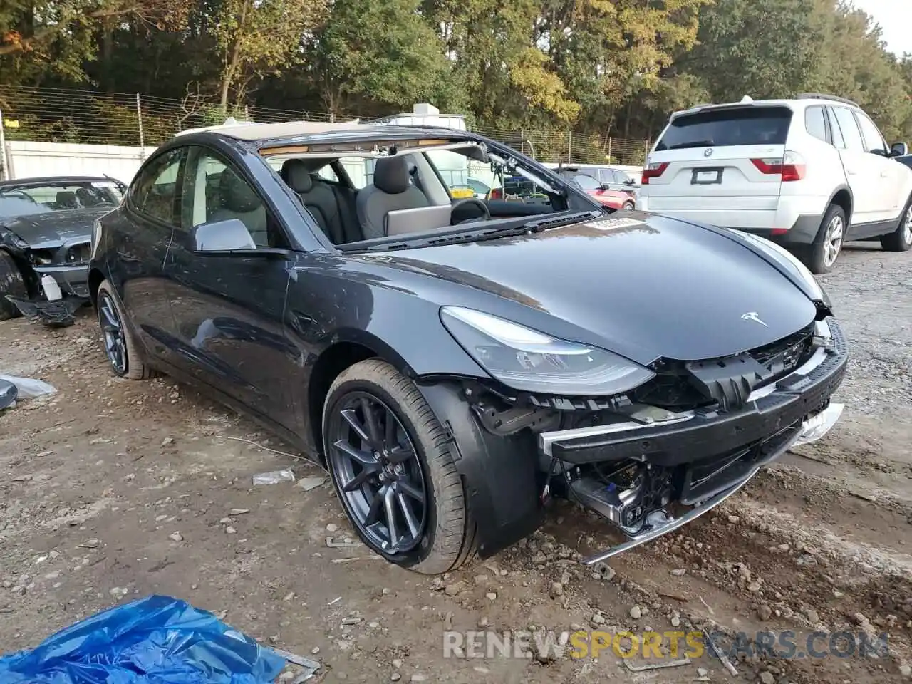 1 Photograph of a damaged car 5YJ3E1EB9NF267483 TESLA MODEL 3 2022