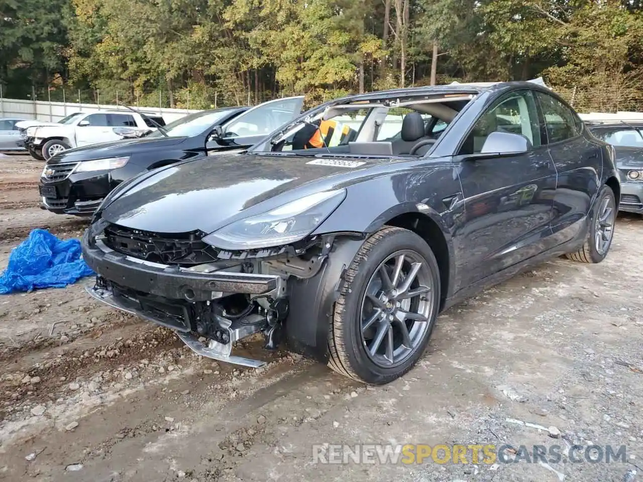 2 Photograph of a damaged car 5YJ3E1EB9NF267483 TESLA MODEL 3 2022