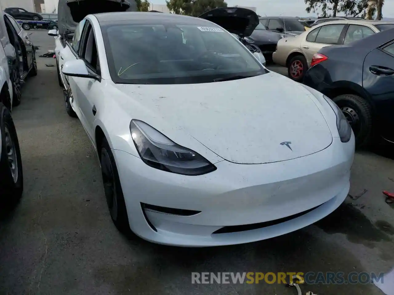 1 Photograph of a damaged car 5YJ3E1EB9NF299401 TESLA MODEL 3 2022