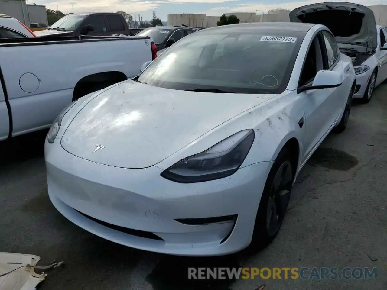 2 Photograph of a damaged car 5YJ3E1EB9NF299401 TESLA MODEL 3 2022