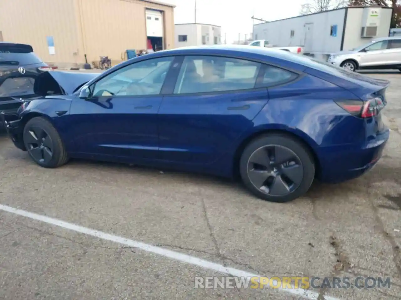 2 Photograph of a damaged car 5YJ3E1EB9NF329898 TESLA MODEL 3 2022