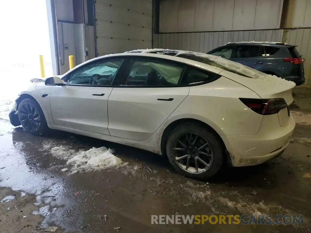 2 Photograph of a damaged car 5YJ3E1EB9NF347687 TESLA MODEL 3 2022