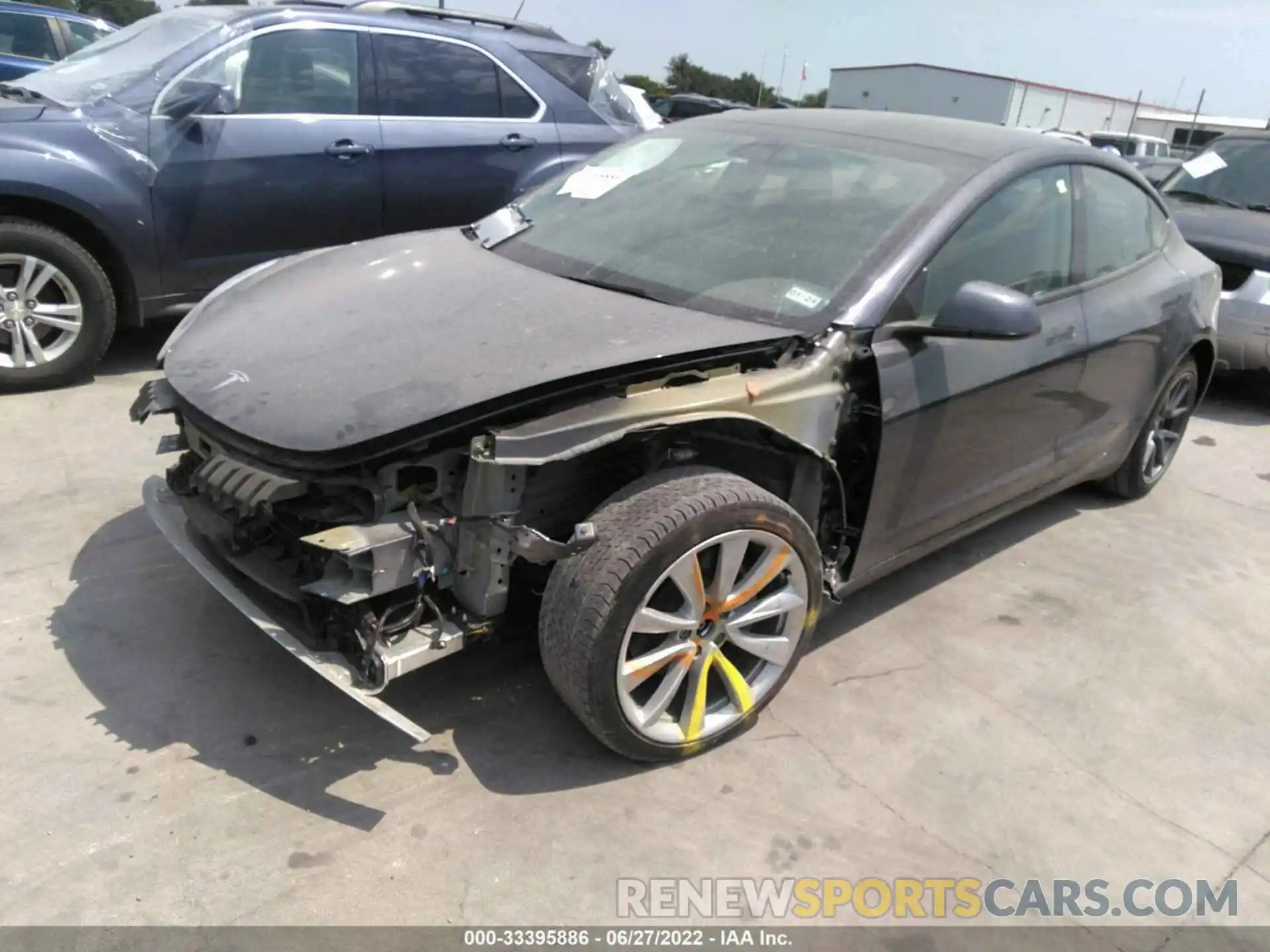 2 Photograph of a damaged car 5YJ3E1EBXNF128673 TESLA MODEL 3 2022