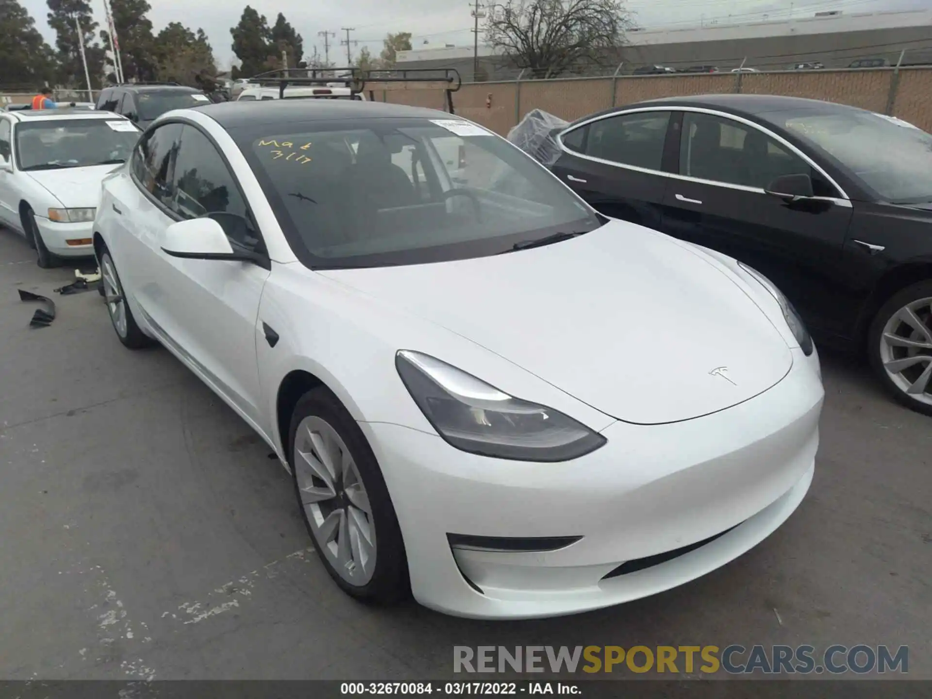 1 Photograph of a damaged car 5YJ3E1EBXNF128981 TESLA MODEL 3 2022