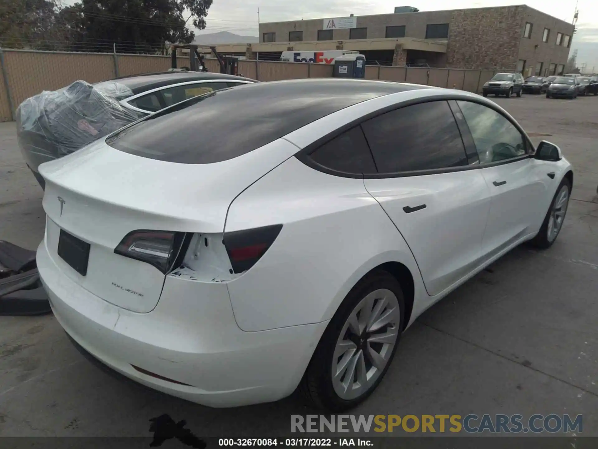 4 Photograph of a damaged car 5YJ3E1EBXNF128981 TESLA MODEL 3 2022